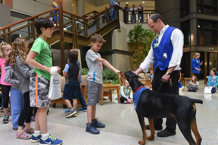 therapy dog henry with kids
