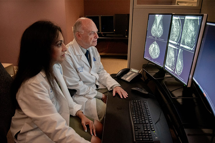 Breast cancer team reviewing imaging