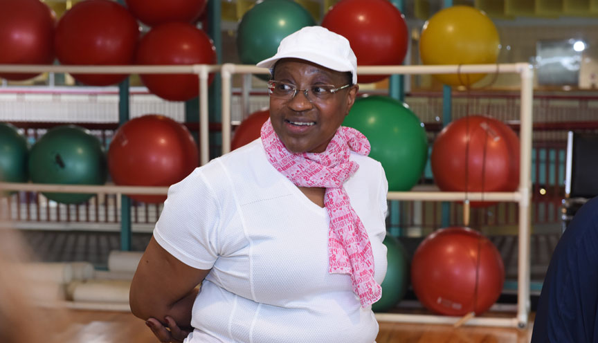 woman smiling in fitness class