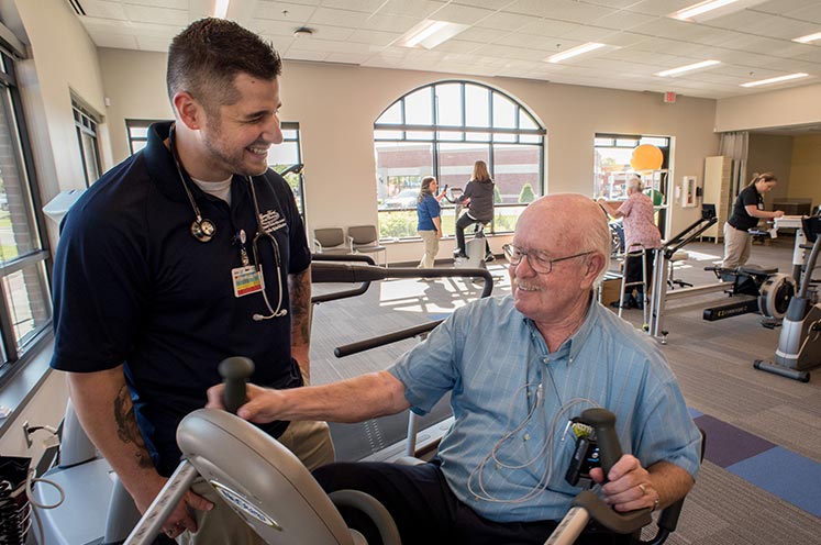 Cardiac Rehab Patient and Trainer