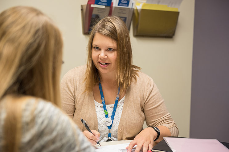 Two woman discussing genetic testing