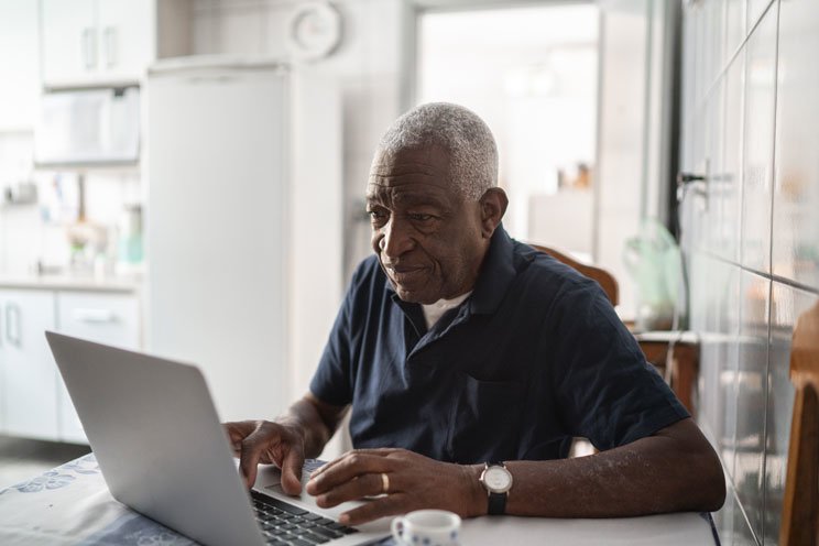 man-looking-at-laptop