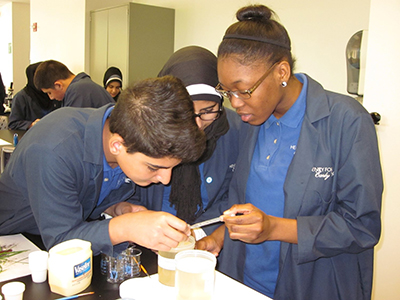 early college students working on project