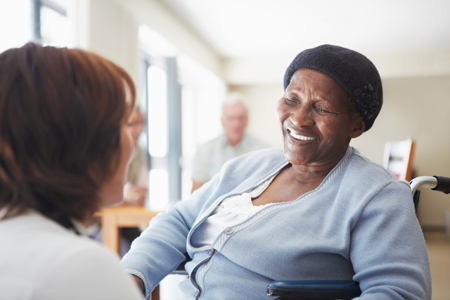 Sharing a smile with her caregiver