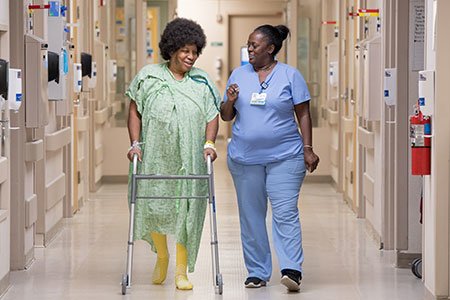 patient using walking assistant