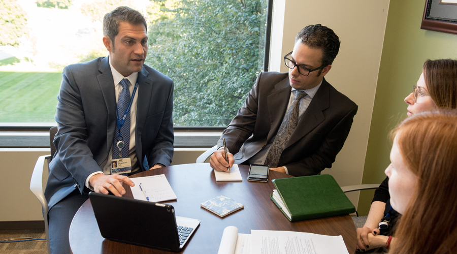 Health services research team in a meeting