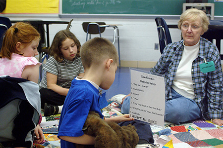 Nielsen teaching a group of kids