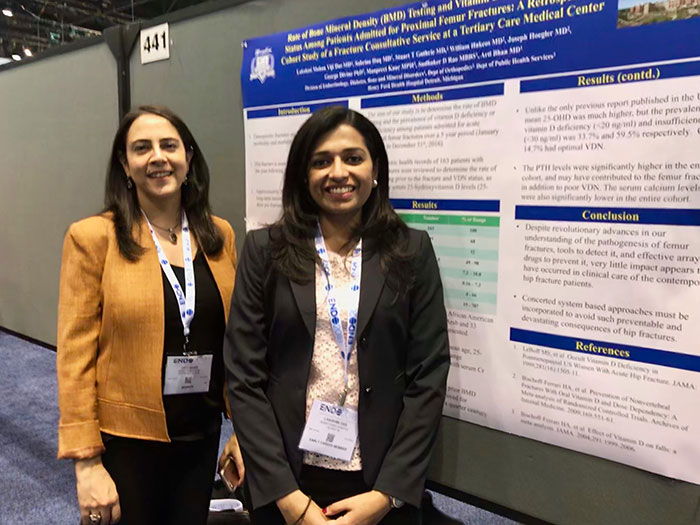 Dr. Bhan with 2nd year fellow Dr. Das presenting her poster.