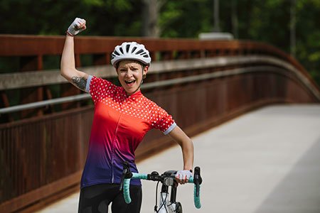 Breast Cancer Patient Miranda with bike gear story