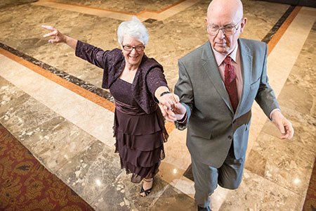 Breast Cancer patient Lillian and her husband ballroom dancing