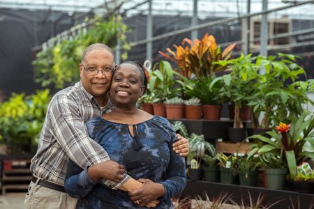 colon cancer patient donald robinson with wife zelda in greenhouse