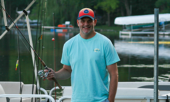 Ron fishing off pontoon boat