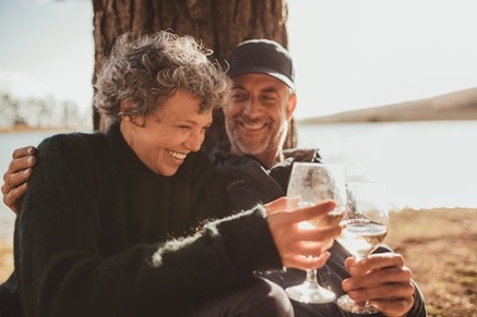 mature couple smiling outside