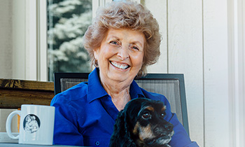 heart patient mary with her dog coco