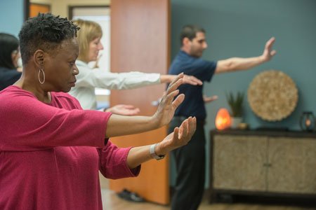 students practicing tai chi