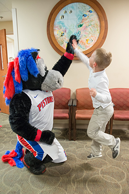 Hooper and Child in Peds Clinic