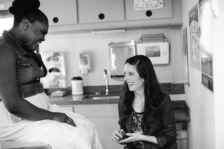 patient with doctor at school based health center