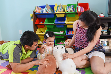 Infertility patient playing with daughter