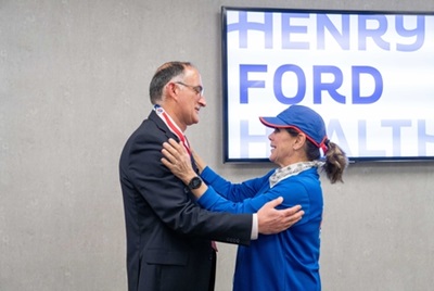 Brenda spine patient hugging doctor