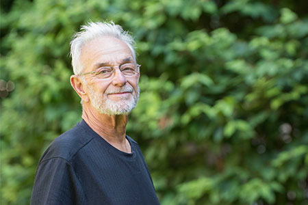 kidney transplant patient frank hribar posing outside