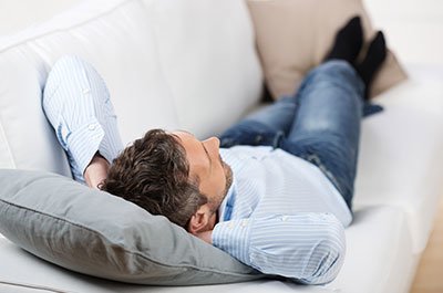 man laying on the couch