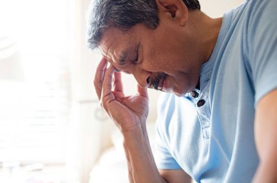 man with a headache