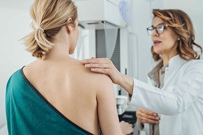 woman getting a mammogram