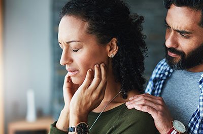 man comforting woman after miscarriage