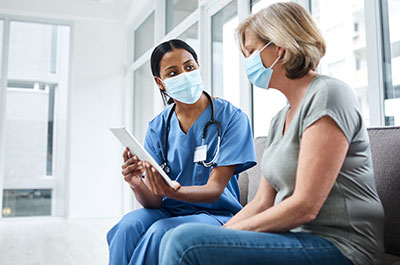 doctor talking to patient