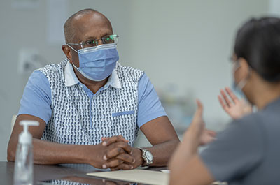 patient talking to doctor