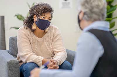 person talking to therapist