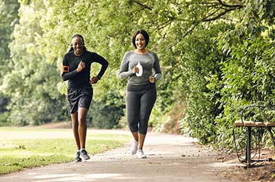 two women running outside
