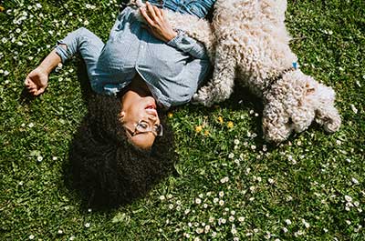 woman with her dog outside