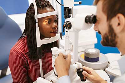 woman getting eye exam