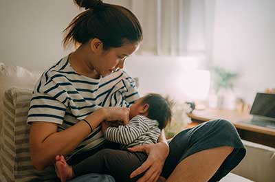 mother breastfeeding baby