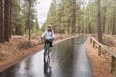 woman riding a bike outside