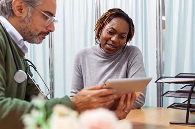 doctor talking to patient