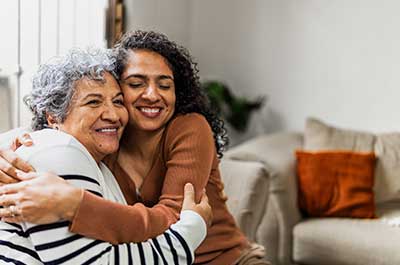 mother and daughter hugging