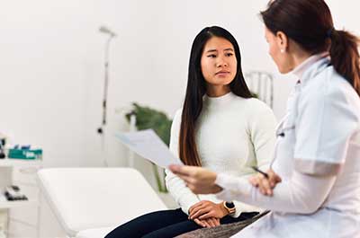 patient talking to doctor