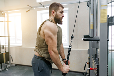 man working out in weighted vest