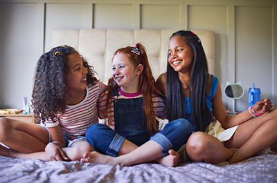 girls having sleepover party