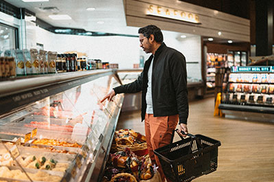 man at grocery store