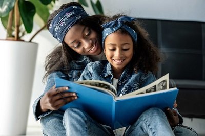 mom and daughter reading