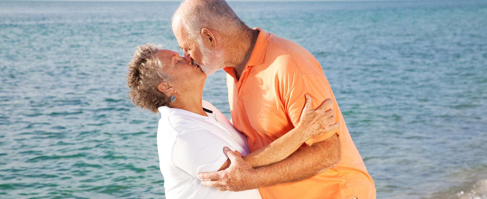 older couple kissing