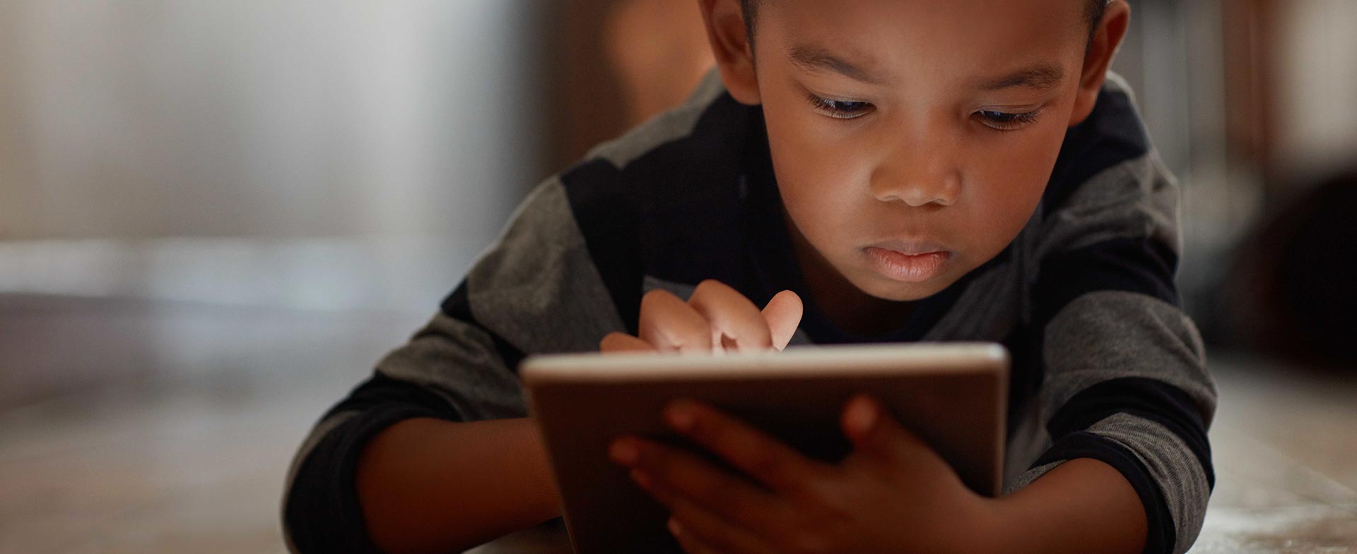 Child using digital device with proper screen time management