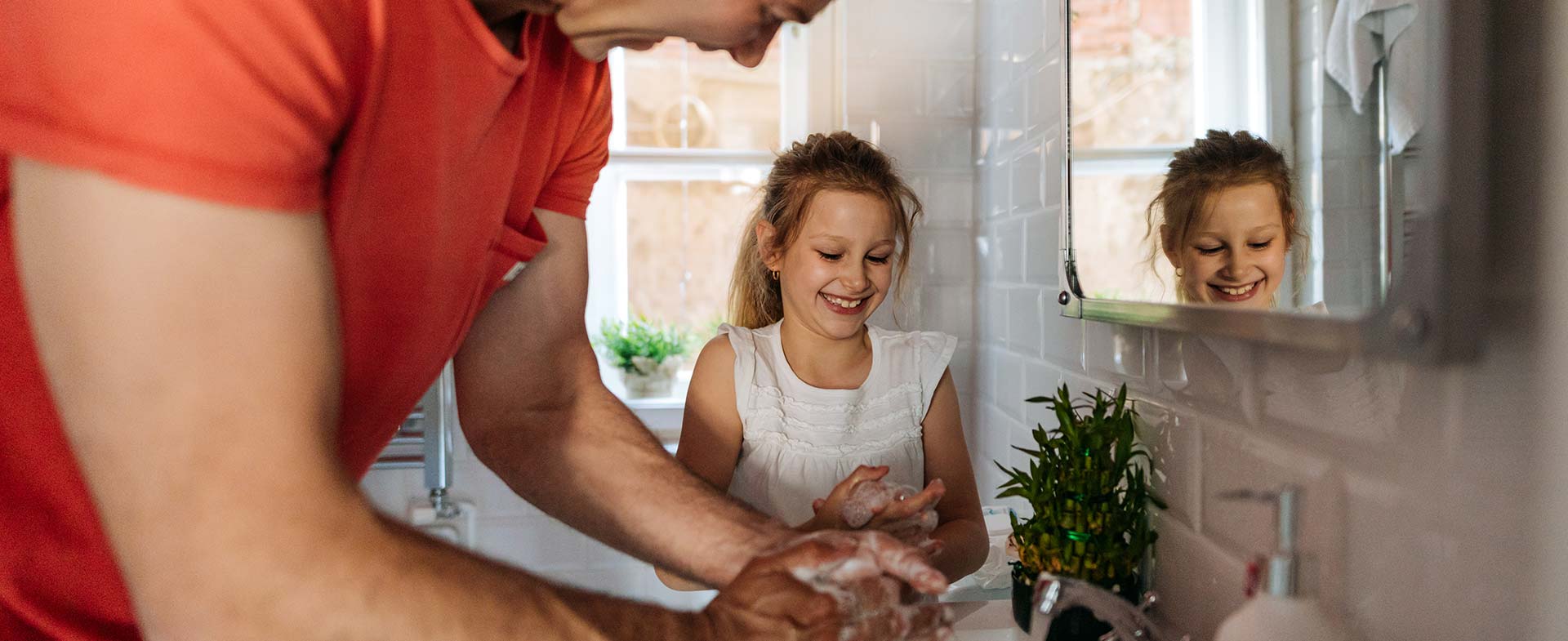 family washing hands