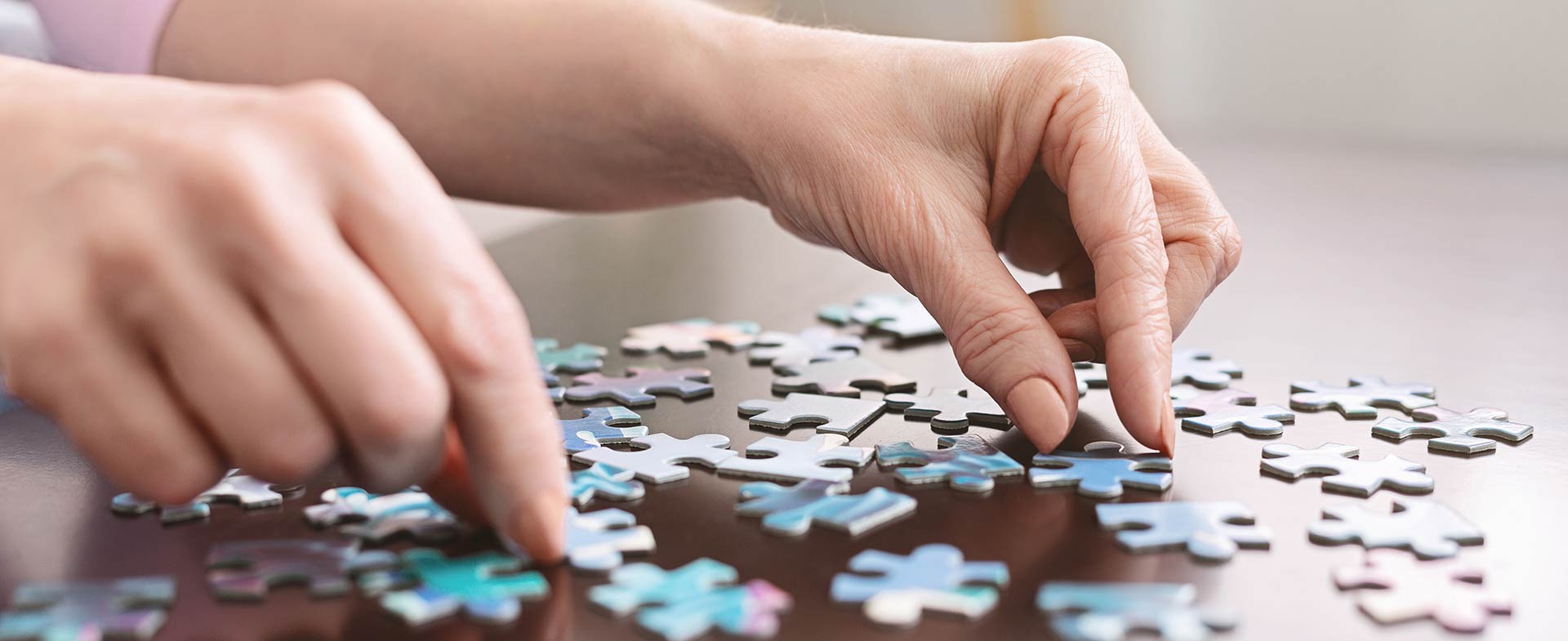 woman doing puzzle