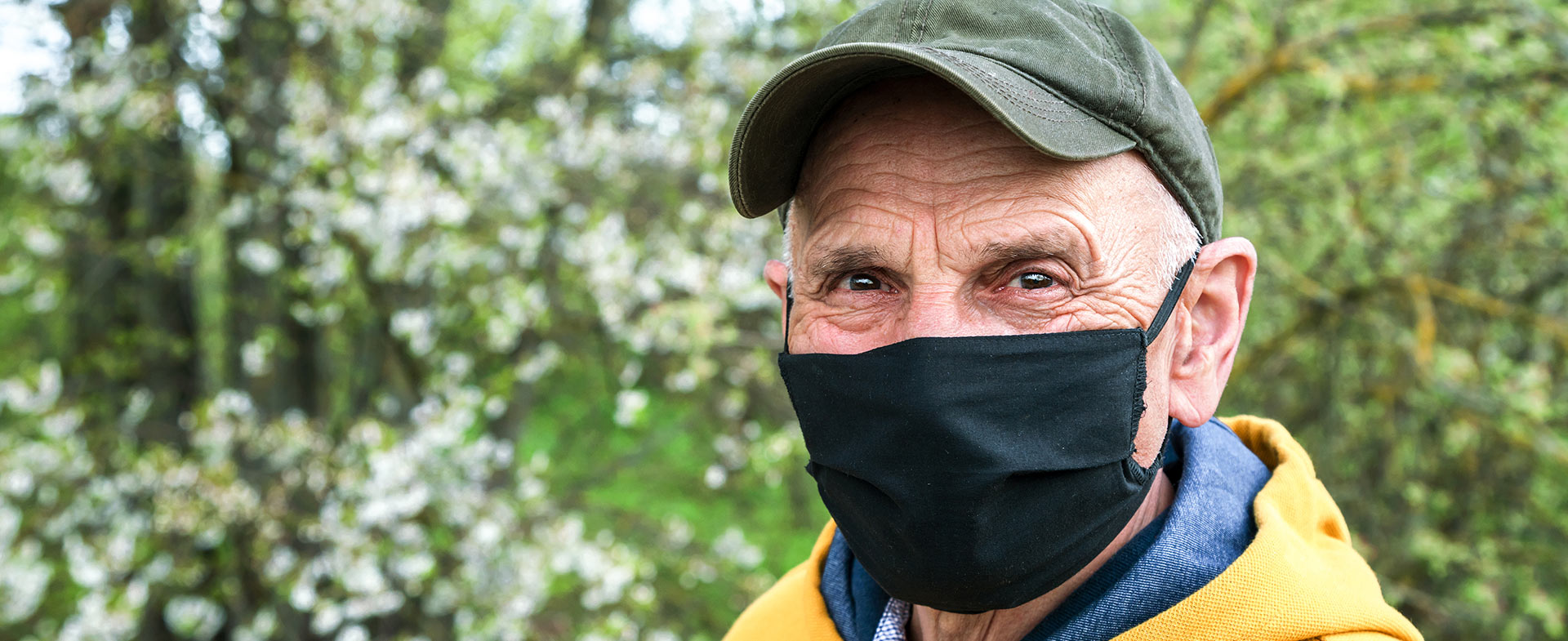older person wearing mask