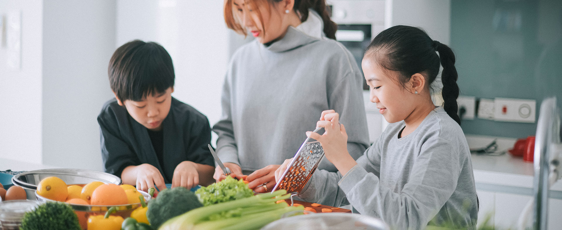 mom and kids cooking