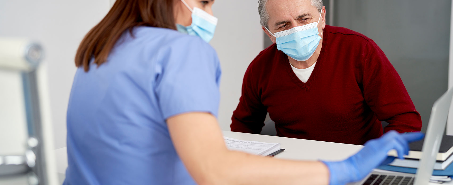 patient talking to doctor